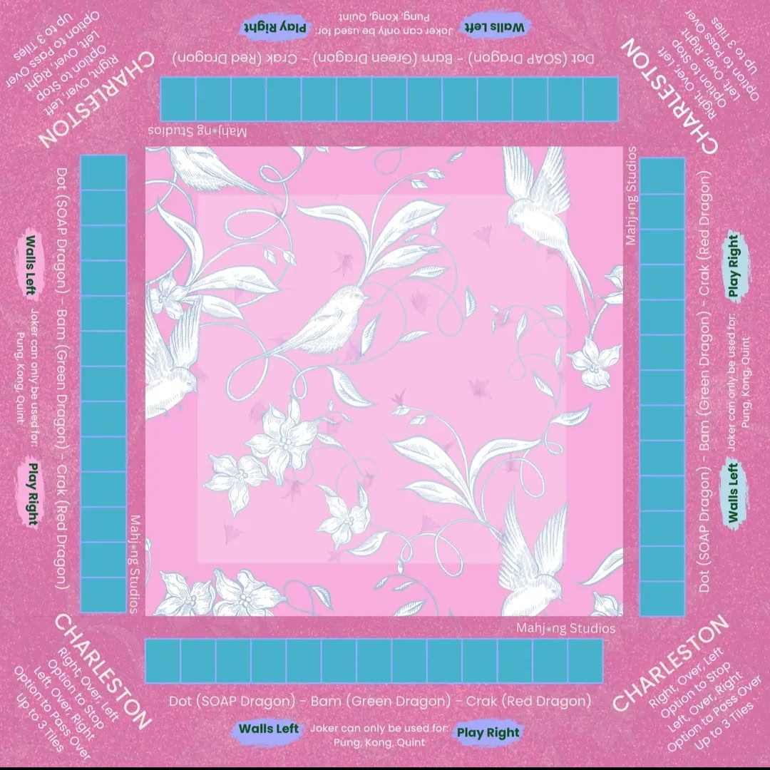 Rose-pink Chinoiserie Mahjong mat with birds, flowers, and blue play areas